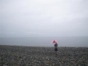 A misty day, the umbrella adds the color contrast to an otherwise very boring picture - Sunshine Coast BC